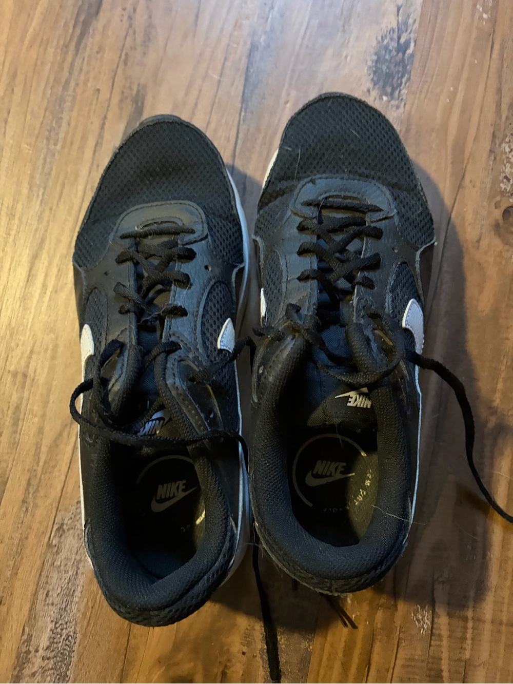 Nike Women’s Black Athletic Sneakers with White Swoosh